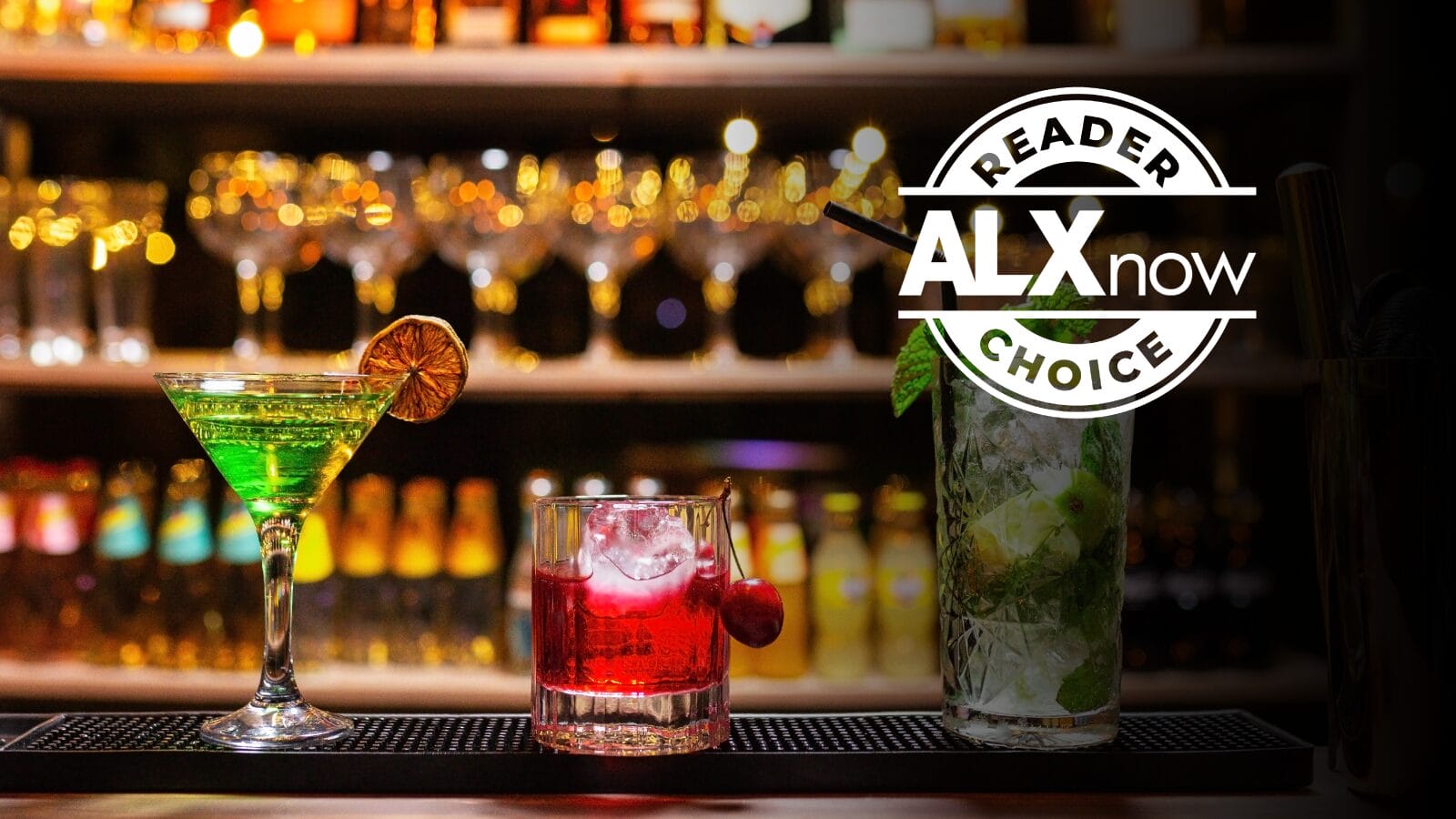 Three cocktails on a bar counter: a green martini with lemon wheel, a red drink with a cherry, and a tall mojito, blurred bottles in the background with an ALX Now Choice badge overlay.
