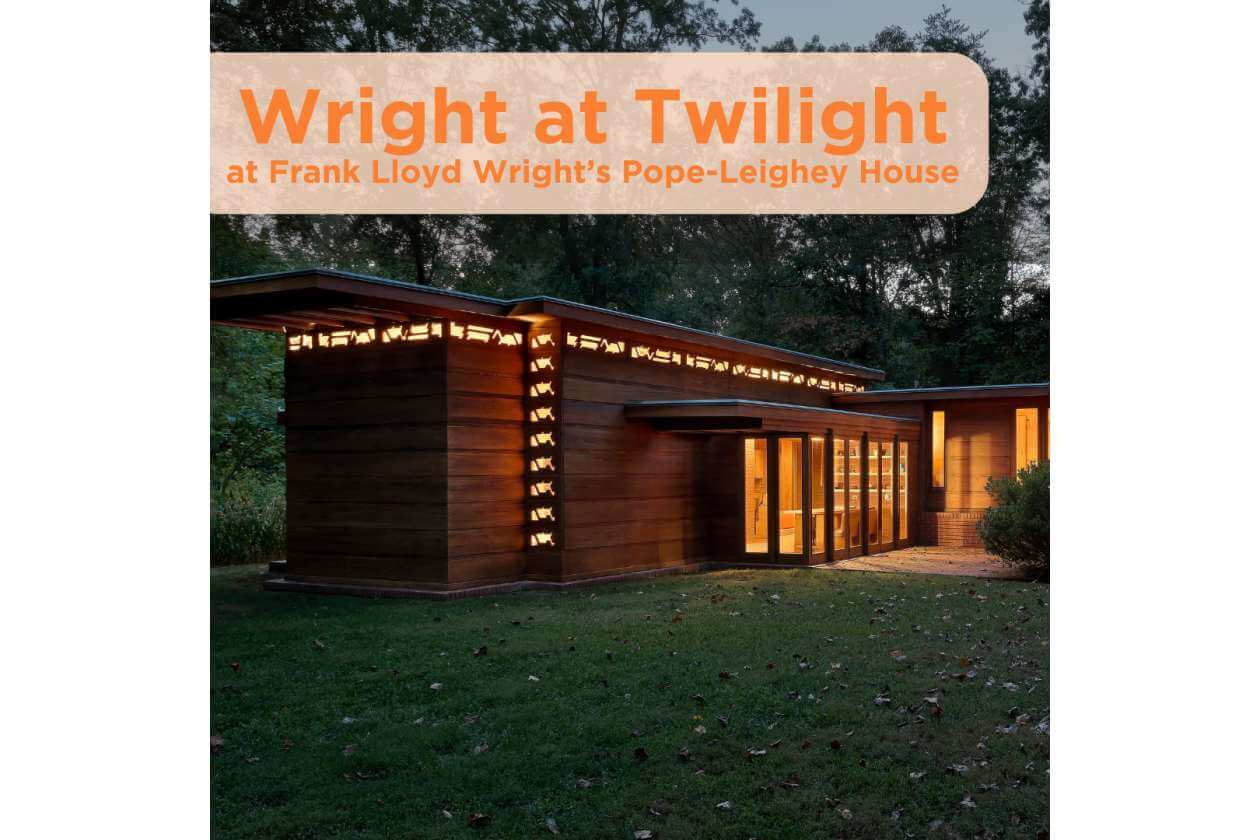 Exterior view of Frank Lloyd Wright's Pope-Leighey House at dusk with warm interior lights visible through glass doors; an orange banner reads 'Wright at Twilight'.