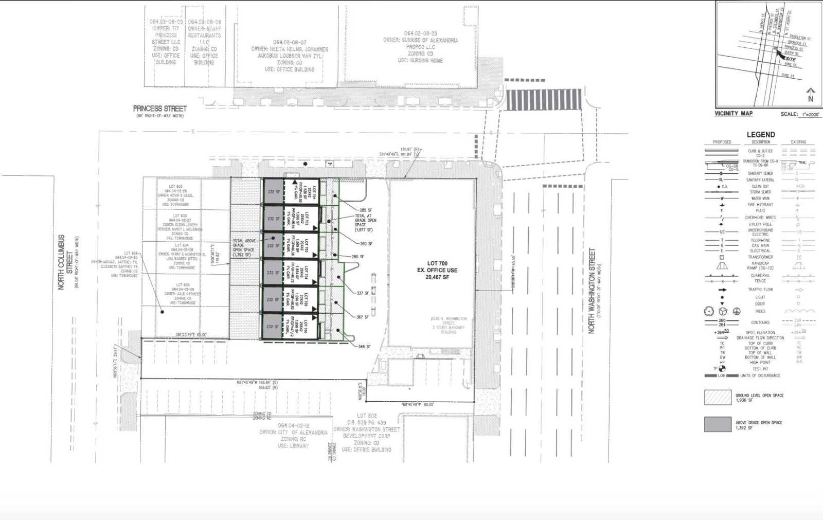 Site plan of a proposed office building with surrounding streets and parking areas.